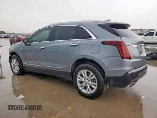 2022 Cadillac XT5 FWD Luxury z VIN 1GYKNAR47NZ116377, wystawiony jako Copart lot #55828415 z przebiegiem 62 276 mil mil oraz Tytuł czysty. Historia ofert i sprzedaży dostępna na DreamBid. Obrazek 2.