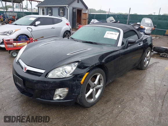 2009 Saturn Sky z VIN 1G8MN35B59Y104152, wystawiony jako IAAI lot #42308236 z przebiegiem 190 823 mil mil oraz . Historia ofert i sprzedaży dostępna na DreamBid. Obrazek 2.