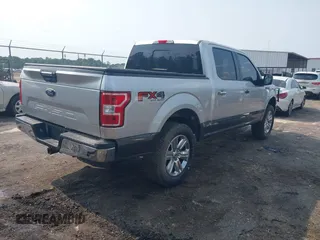 2018 Ford F-150 XL with VIN 1FTEW1E50JFE38143, listed as a IAAI auction lot 42426811 with 115,430 mi miles and . Bid and sale history available at DreamBid. Image 4.