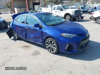2017 Toyota Corolla L z VIN 5YFBURHE7HP674181, wystawiony jako IAAI lot #42140759 z przebiegiem 124 709 mil mil oraz . Historia ofert i sprzedaży dostępna na DreamBid. Obrazek 1.