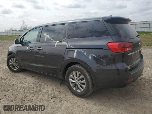 2021 Kia Sedona LX with VIN KNDMB5C17M6665266, listed as a Copart auction lot 48129495 with 57,274 mi miles and Salvage Title. Bid and sale history available at carsss.com. Image 2.