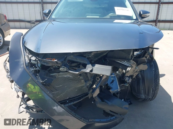 2022 Mazda CX-30 S Premium with VIN 3MVDMBDL5NM416649, listed as a IAAI auction lot 41990745 with 13,923 mi miles and . Bid and sale history available at DreamBid. Image 6.