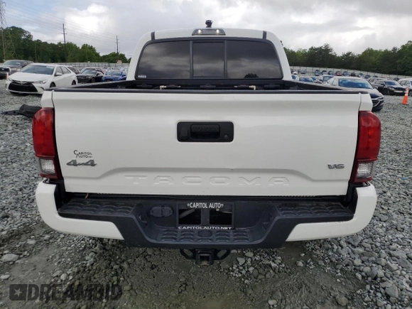 2021 Toyota Tacoma SR с VIN 3TMCZ5AN4MM386662, выставлен на аукционе Copart как лот 56954865 с пробегом 70 623 миль миль и Списание • Salvage title. История ставок и продаж доступна на DreamBid. Изображение 6.