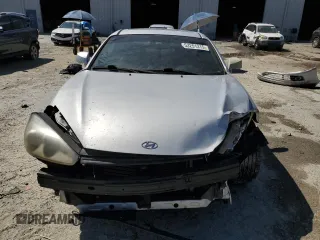 2008 Hyundai Tiburon GT z VIN KMHHN66F88U284030, wystawiony jako Copart lot #53251315 z przebiegiem Nie podano mil oraz Szkody całkowita. Historia ofert i sprzedaży dostępna na DreamBid. Obrazek 5.