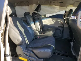2013 Toyota Sienna SE с VIN 5TDXK3DC9DS390825, выставлен на аукционе Copart как лот 82363794 с пробегом 244 673 миль миль и Списание • Salvage title. История ставок и продаж доступна на DreamBid. Изображение 11.