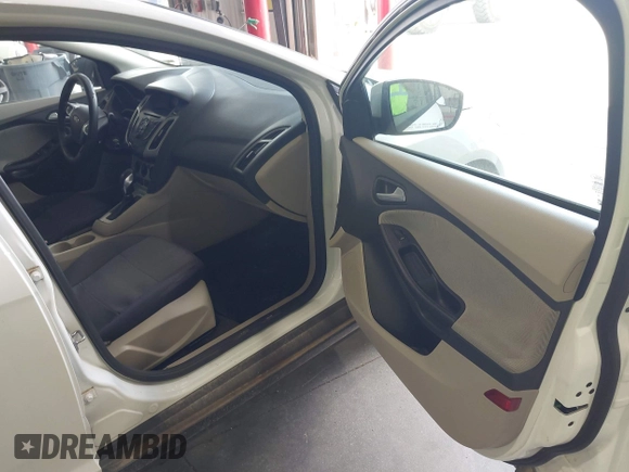 2012 Ford Focus SE with VIN 1FAHP3F23CL404590, listed as a IAAI auction lot 42671869 with 180,941 mi miles and . Bid and sale history available at DreamBid. Image 5.