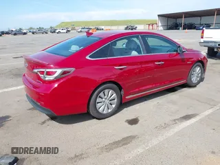 2016 Hyundai Sonata Hybrid SE with VIN KMHE24L18GA026079, listed as a IAAI auction lot 42051741 with 116,076 mi miles. Bid and sale history available at carsss.com. Image 4.