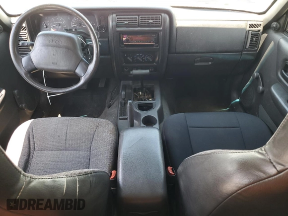 2000 Jeep Cherokee SE with VIN 1J4FF28SXYL140930, listed as a Copart auction lot 59191035 with 248,598 mi miles and Salvage title. Bid and sale history available at DreamBid. Image 8.