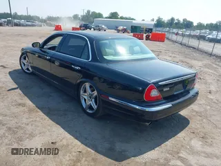 2007 Jaguar XJ Vanden Plas z VIN SAJWA82B87SH13560, wystawiony jako IAAI lot #42502145 z przebiegiem 211 075 mil mil oraz . Historia ofert i sprzedaży dostępna na DreamBid. Obrazek 3.