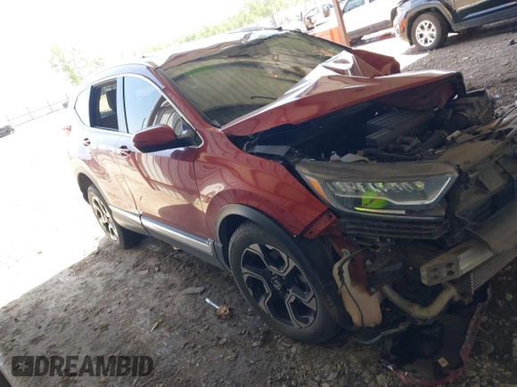 2018 Honda CR-V Touring with VIN 2HKRW2H92JH659660, listed as a IAAI auction lot 42266819 with 11 mi miles and . Bid and sale history available at DreamBid. Image 1.