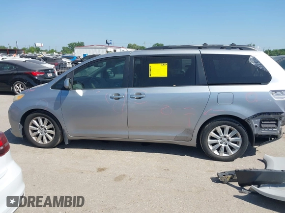 2012 Toyota Sienna XLE AAS with VIN 5TDYK3DC7CS185555, listed as a IAAI auction lot 42013098 with 140,969 mi miles. Bid and sale history available at carsss.com. Image 15.