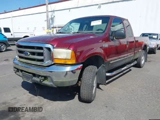 2000 Ford Super Duty F-250 XL with VIN 1FTNX21S9YEA04155, listed as a IAAI auction lot 42136440 with 149,069 mi miles. Bid and sale history available at carsss.com. Image 2.