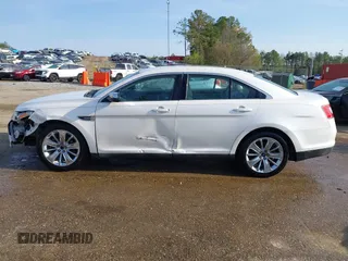 2012 Ford Taurus Limited z VIN 1FAHP2FW1CG103595, wystawiony jako IAAI lot #41913906 z przebiegiem 308 496 mil mil oraz . Historia ofert i sprzedaży dostępna na DreamBid. Obrazek 14.