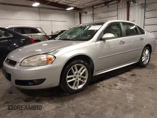 2014 Chevrolet Impala LTZ with VIN 2G1WC5E3XE1157931, listed as a IAAI auction lot 42688907 with 119,985 mi miles and . Bid and sale history available at DreamBid. Image 2.