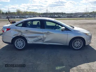2012 Ford Focus SEL with VIN 1FAHP3H29CL151658, listed as a IAAI auction lot 42060139 with 149,547 mi miles and . Bid and sale history available at carsss.com. Image 13.