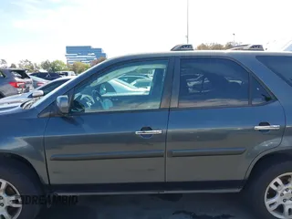 2004 Acura MDX Touring Pkg w/Navigation with VIN 2HNYD18834H517618, listed as a IAAI auction lot 42003807 with 186,555 mi miles. Bid and sale history available at carsss.com. Image 14.