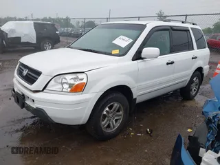 2005 Honda Pilot EX-L z VIN 5FNYF18595B052324, wystawiony jako IAAI lot #42366327 z przebiegiem 153 121 mil mil oraz . Historia ofert i sprzedaży dostępna na DreamBid. Obrazek 17.