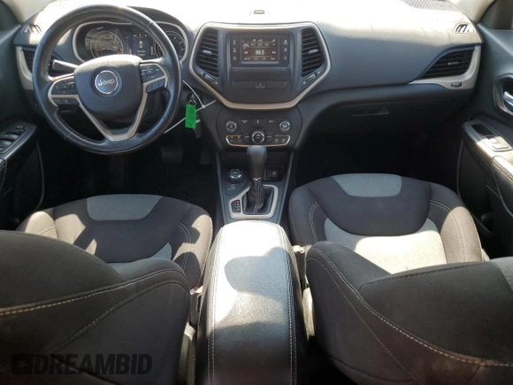 2015 Jeep Cherokee Sport with VIN 1C4PJMAB7FW773265, listed as a Copart auction lot 61134045 with 117,628 mi miles and Salvage title. Bid and sale history available at DreamBid. Image 8.