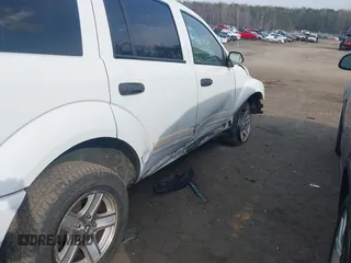 2004 Dodge Durango SLT z VIN 1D4HD48N44F217233, wystawiony jako IAAI lot #41792773 z przebiegiem 105 741 mil mil oraz . Historia ofert i sprzedaży dostępna na DreamBid. Obrazek 6.