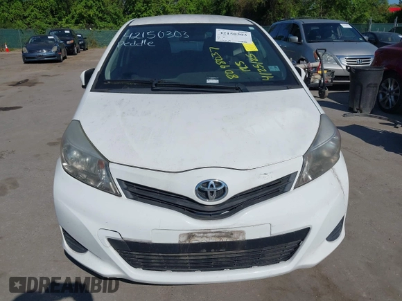 2014 Toyota Yaris L with VIN VNKJTUD35EA011933, listed as a IAAI auction lot 42150303 with 114,369 mi miles. Bid and sale history available at carsss.com. Image 6.