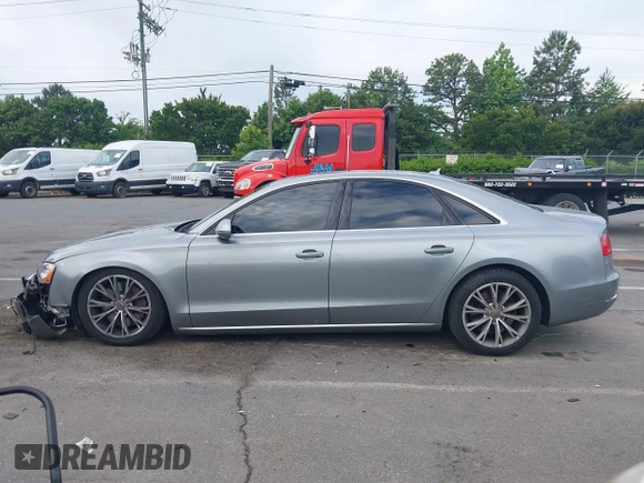 2011 Audi A8 with VIN WAUAVAFD0BN018197, listed as a IAAI auction lot 42221435 with 74,465 mi miles and . Bid and sale history available at DreamBid. Image 15.