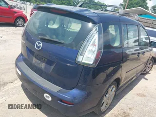 2009 Mazda 5 Touring with VIN JM1CR29L890340411, listed as a IAAI auction lot 42270019 with 150,892 mi miles and . Bid and sale history available at DreamBid. Image 4.