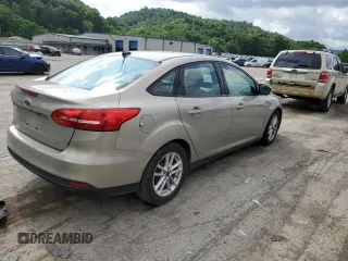 2015 Ford Focus SE z VIN 1FADP3F29FL312757, wystawiony jako Copart lot #61198315 z przebiegiem 84 944 mil mil oraz Szkoda całkowita • Salvage title. Historia ofert i sprzedaży dostępna na DreamBid. Obrazek 3.