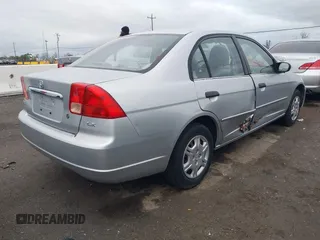 2001 Honda Civic LX with VIN 2HGES15561H561957, listed as a IAAI auction lot 41487631 with 214,529 mi miles. Bid and sale history available at carsss.com. Image 4.