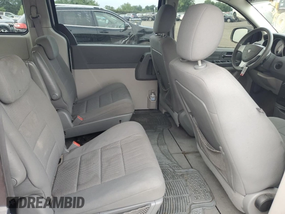 2009 Dodge Grand Caravan SE z VIN 2D8HN44E29R591969, wystawiony jako Copart lot #64255535 z przebiegiem 154 214 mil mil oraz Szkoda całkowita • Salvage title. Historia ofert i sprzedaży dostępna na DreamBid. Obrazek 11.