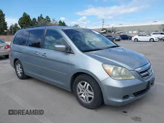 2007 Honda Odyssey EX-L with VIN 5FNRL38727B017587, listed as a IAAI auction lot 41900739 with 216,909 mi miles and . Bid and sale history available at carsss.com. Image 1.