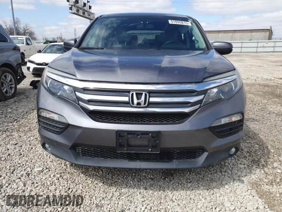 2016 Honda Pilot EX-L with VIN 5FNYF6H52GB099677, listed as a Copart auction lot 51095815 with 101,817 mi miles and Salvage Title. Bid and sale history available at carsss.com. Image 5.