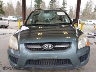 2009 Kia Sportage LX with VIN KNDJE723X97573885, listed as a IAAI auction lot 41788620 with 136,650 mi miles. Bid and sale history available at carsss.com. Image 12.