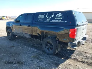 2015 Chevrolet Silverado 1500 LT with VIN 1GCVKREC3FZ332669, listed as a IAAI auction lot 41680418 with 106,095 mi miles and . Bid and sale history available at DreamBid. Image 3.