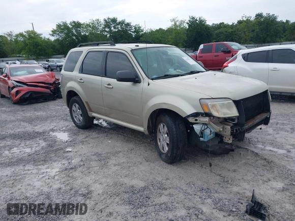 2011 Mercury Mariner z VIN 4M2CN8B72BKJ03915, wystawiony jako IAAI lot #42358251 z przebiegiem 169 206 mil mil oraz . Historia ofert i sprzedaży dostępna na DreamBid. Obrazek 1.