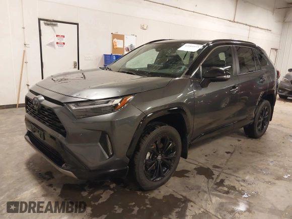 2023 Toyota RAV4 Hybrid XSE with VIN 4T3E6RFV7PU124140, listed as a IAAI auction lot 42201073 with 50,942 mi miles and . Bid and sale history available at DreamBid. Image 2.