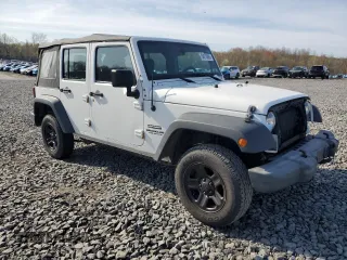 2016 Jeep Wrangler Unlimited Sport with VIN 1C4BJWDG4GL235252, listed as a Copart auction lot 54218885 with 118,849 mi miles and Salvage Title. Bid and sale history available at DreamBid. Image 4.