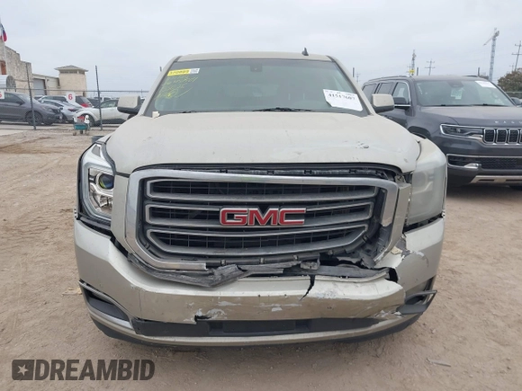 2015 GMC Yukon XL SLE z VIN 1GKS1GKC1FR155056, wystawiony jako IAAI lot #41517607 z przebiegiem 174 634 mil mil oraz . Historia ofert i sprzedaży dostępna na DreamBid. Obrazek 12.