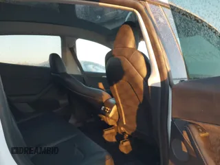 2023 Tesla Model Y Long Range z VIN 7SAYGDEE6PA061228, wystawiony jako IAAI lot #41371547 z przebiegiem 25 121 mil mil oraz . Historia ofert i sprzedaży dostępna na DreamBid. Obrazek 8.