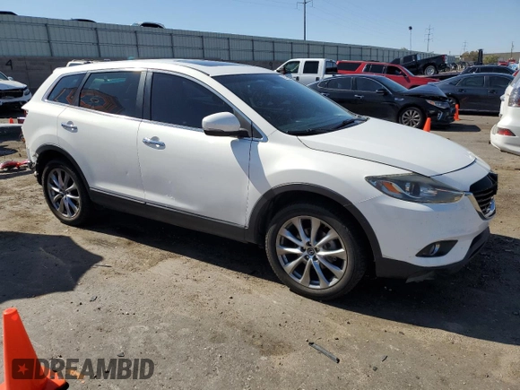 2014 Mazda CX-9 Grand Touring with VIN JM3TB3DA5E0431539, listed as a Copart auction lot 62418005 with 139,686 mi miles and Salvage title. Bid and sale history available at DreamBid. Image 4.