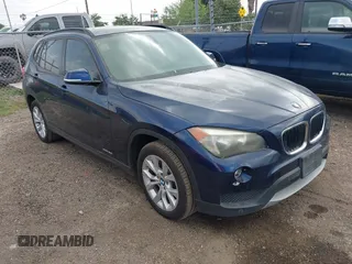 2014 BMW X1 xDrive28i z VIN WBAVL1C59EVY21034, wystawiony jako IAAI lot #42221275 z przebiegiem 99 487 mil mil oraz . Historia ofert i sprzedaży dostępna na DreamBid. Obrazek 1.