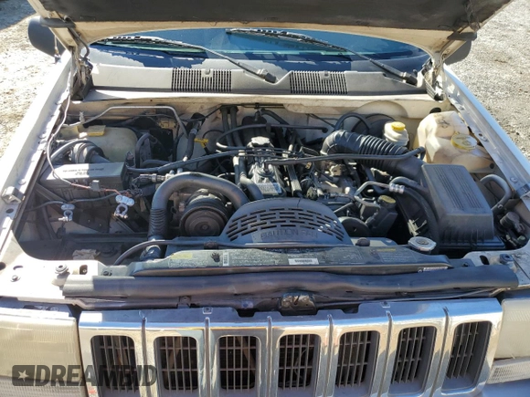 1996 Jeep Grand Cherokee Laredo with VIN 1J4FX58SXTC349575, listed as a Copart auction lot 80545584 with 302,636 mi miles and Salvage Title. Bid and sale history available at carsss.com. Image 12.