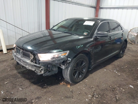 2015 Ford Taurus SE with VIN 1FAHP2D91FG160042, listed as a IAAI auction lot 41330894 with 167,897 mi miles. Bid and sale history available at carsss.com. Image 17.