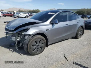 2024 Tesla Model Y Long Range z VIN 7SAYGAEE6RF168333, wystawiony jako Copart lot #54452705 z przebiegiem 14 066 mil mil oraz Szkoda całkowita • Salvage title. Historia ofert i sprzedaży dostępna na DreamBid. Obrazek 1.