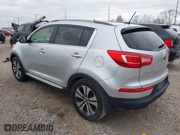 2013 Kia Sportage EX with VIN KNDPCCA22D7484936, listed as a IAAI auction lot 41921531 with 128,001 mi miles and . Bid and sale history available at DreamBid. Image 3.