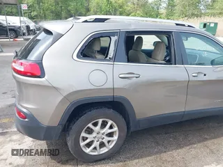 2016 Jeep Cherokee Latitude with VIN 1C4PJMCS6GW242153, listed as a IAAI auction lot 42107782 with 90,562 mi miles and . Bid and sale history available at carsss.com. Image 6.