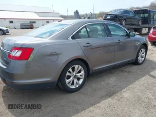 2012 Ford Taurus SEL z VIN 1FAHP2EWXCG138038, wystawiony jako IAAI lot #42007614 z przebiegiem 155 045 mil mil oraz . Historia ofert i sprzedaży dostępna na DreamBid. Obrazek 4.