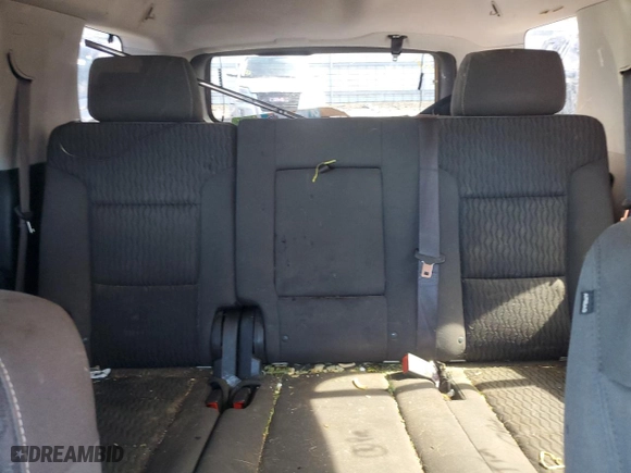 2015 Chevrolet Tahoe LS with VIN 1GNSKAKC2FR252599, listed as a Copart auction lot 48714885 with 140,946 mi miles and Salvage Title. Bid and sale history available at carsss.com. Image 10.