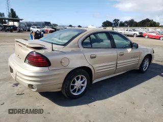 2001 Pontiac Grand Am SE z VIN 1G2NE52T91M583582, wystawiony jako Copart lot #77808974 z przebiegiem 126 219 mil mil oraz Szkoda całkowita • Salvage title. Historia ofert i sprzedaży dostępna na DreamBid. Obrazek 3.
