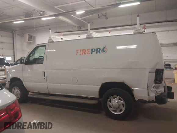 2012 Ford Econoline Cargo Recreational with VIN 1FTNE2EW4CDB03757, listed as a IAAI auction lot 42072612 with 147,153 mi miles. Bid and sale history available at carsss.com. Image 14.