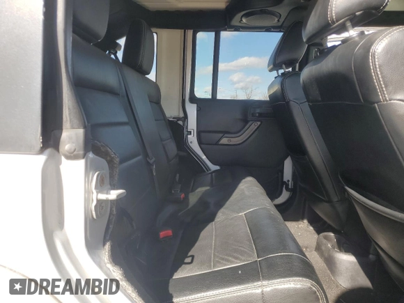 2012 Jeep Wrangler Unlimited Altitude z VIN 1C4HJWEG3CL169991, wystawiony jako Copart lot #45489175 z przebiegiem Nie podano mil oraz Szkoda całkowita • Salvage title. Historia ofert i sprzedaży dostępna na DreamBid. Obrazek 11.